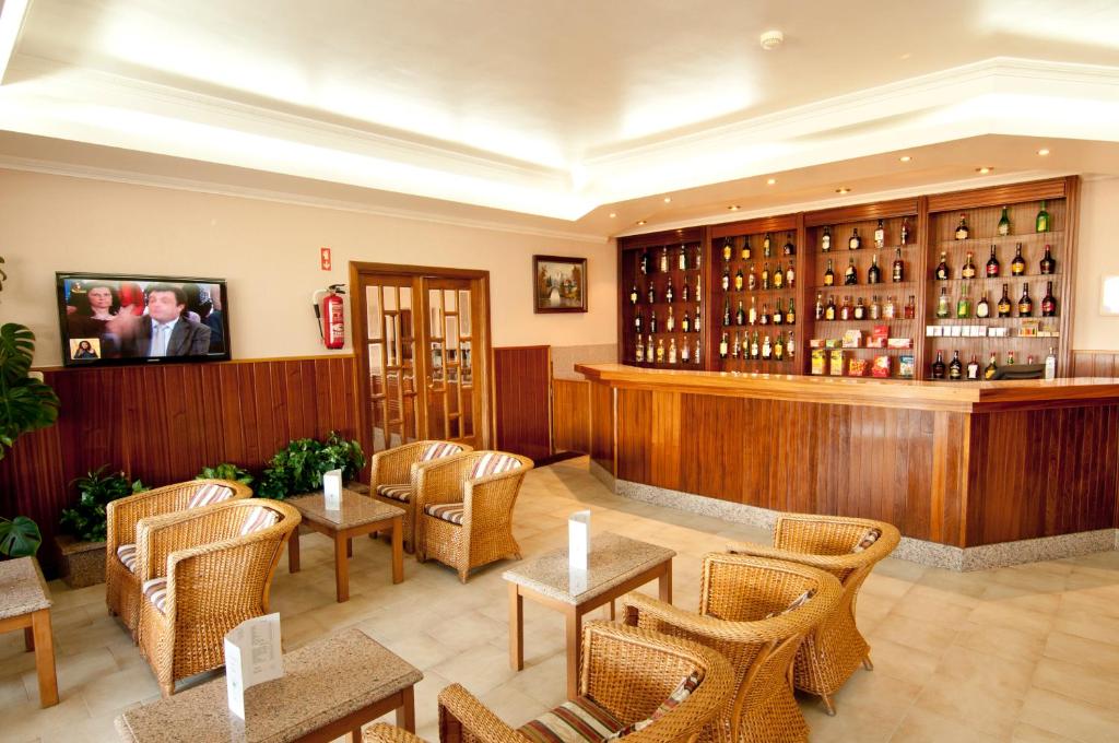 A rea de bar ou lounge em Hotel Belsol