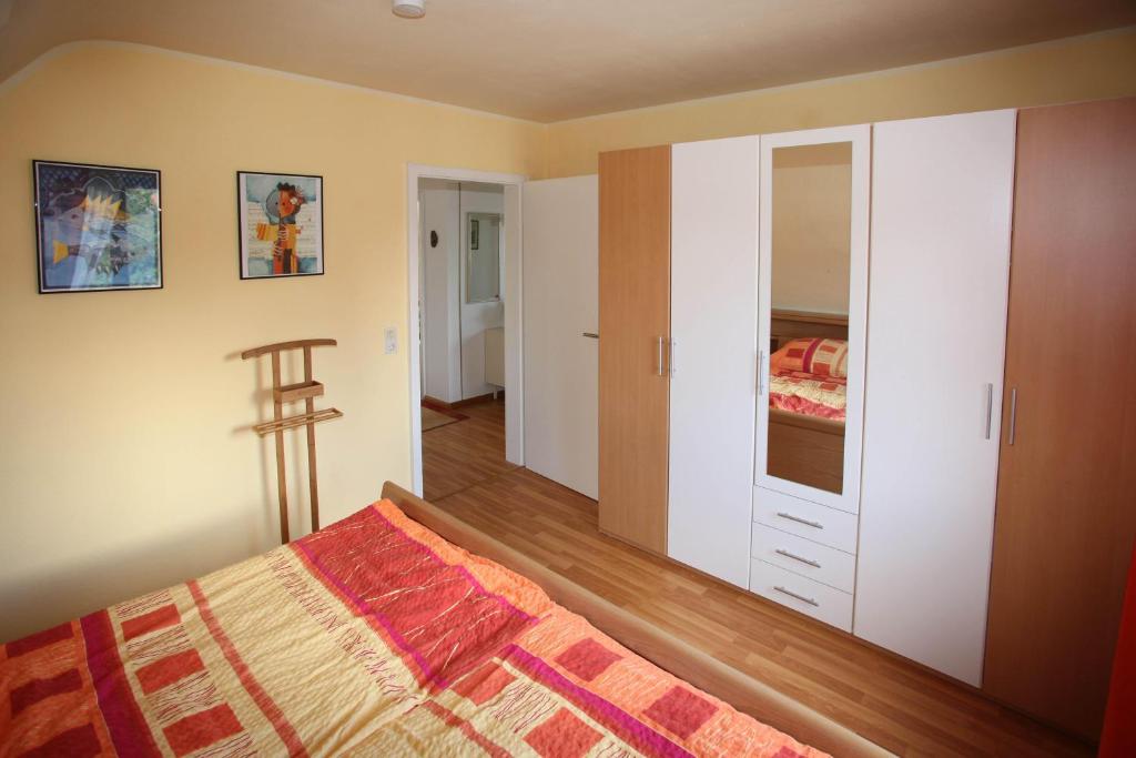 Postel nebo postele na pokoji v ubytování Elzachferien