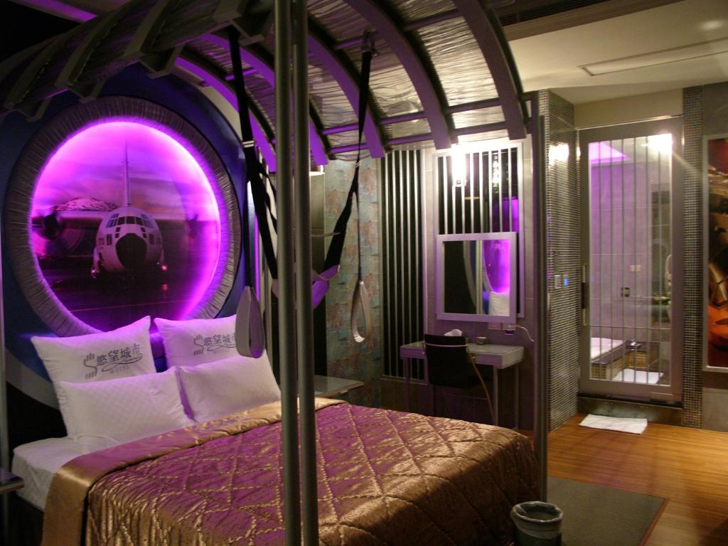 Postel nebo postele na pokoji v ubytování Sexy City Motel