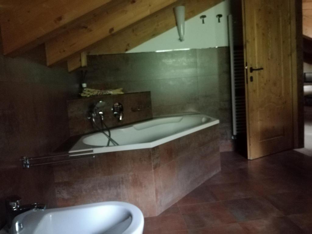 Koupelna v ubytování Hotel Bait de Angial