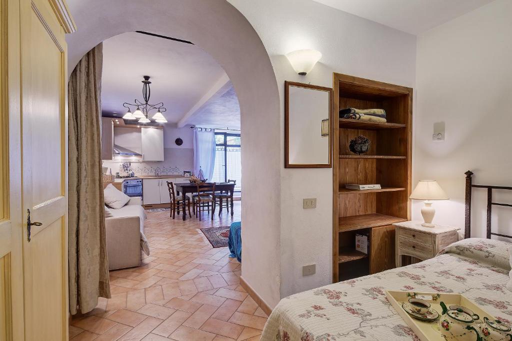 Posteľ alebo postele v izbe v ubytovaní La Loggetta - Apartments