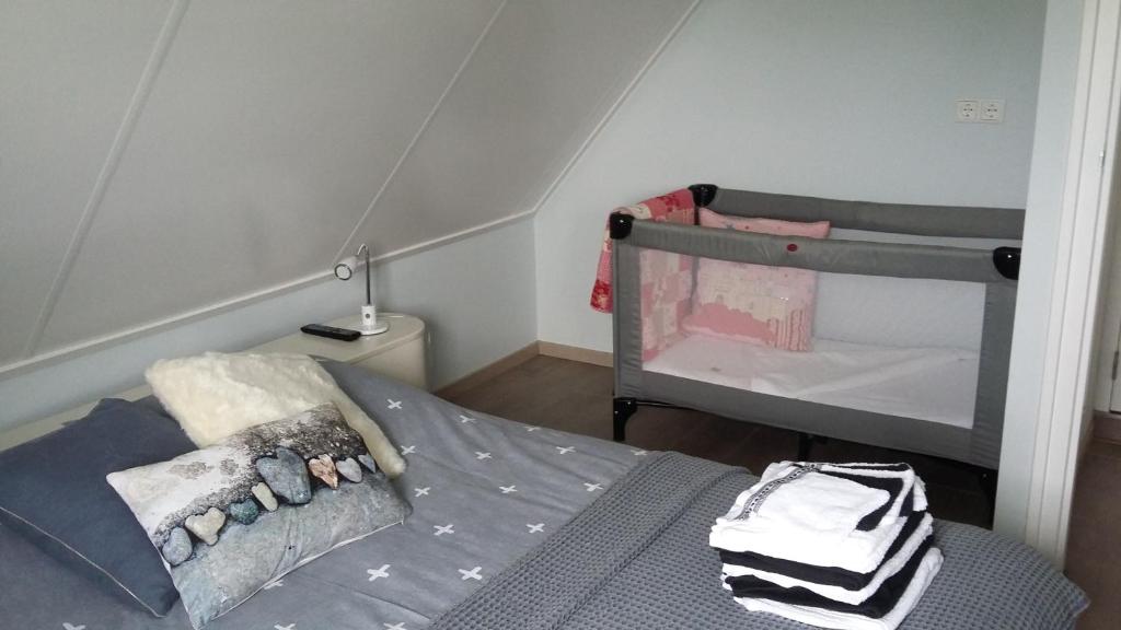 Postel nebo postele na pokoji v ubytování An en Bie