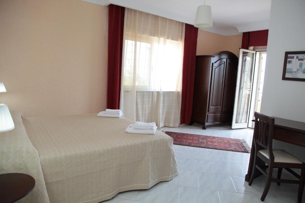 Łóżko lub łóżka w pokoju w obiekcie Bed And Breakfast casagalez
