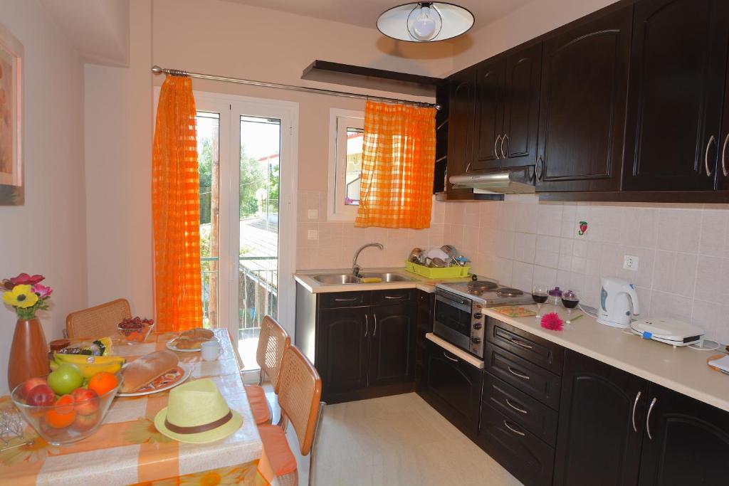 Kuchyň nebo kuchyňský kout v ubytování Alexandra Apartment