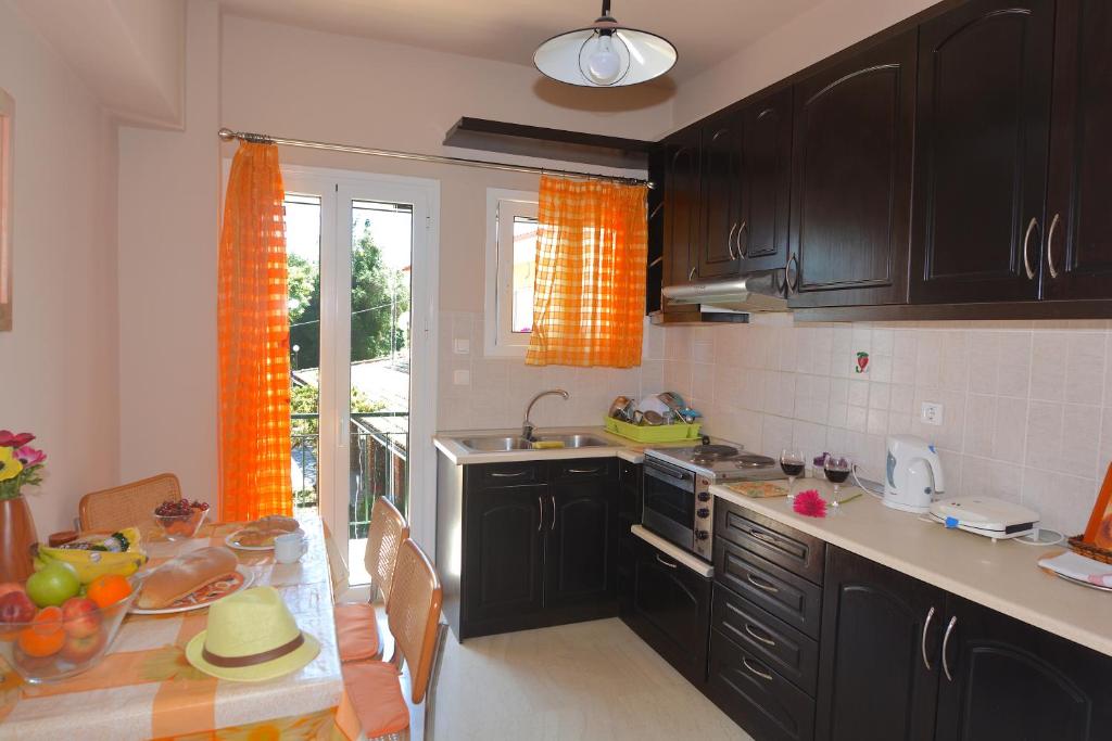 Kuchyň nebo kuchyňský kout v ubytování Alexandra Apartment