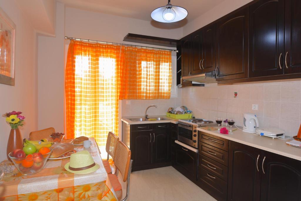 Kuchyň nebo kuchyňský kout v ubytování Alexandra Apartment