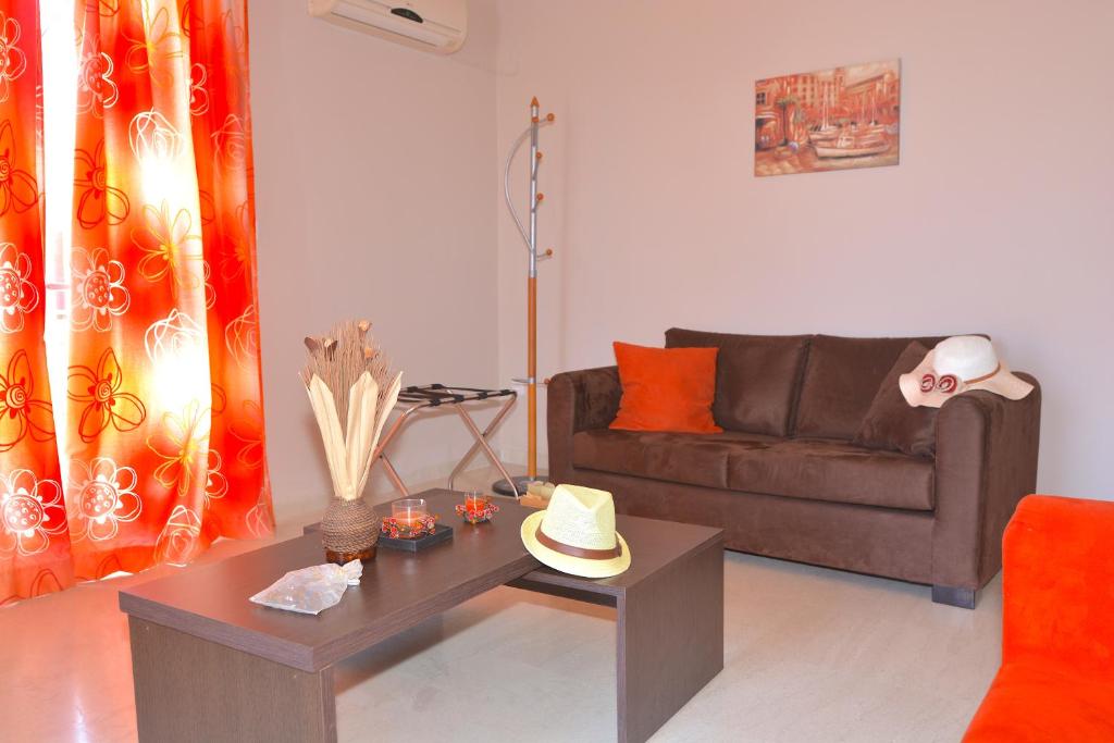 Posezení v ubytování Alexandra Apartment