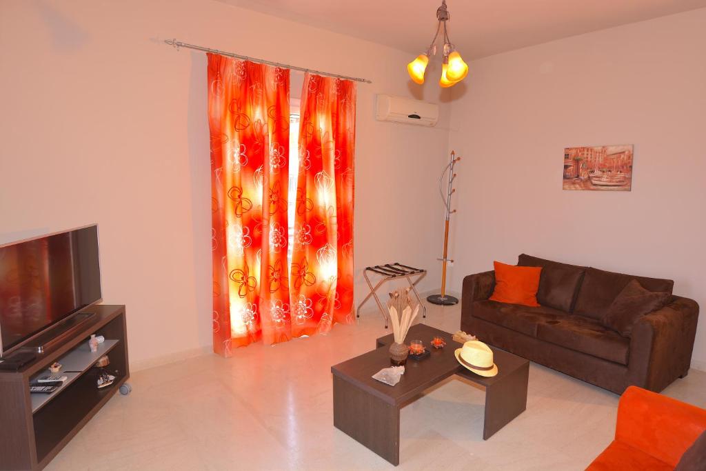 Posezení v ubytování Alexandra Apartment