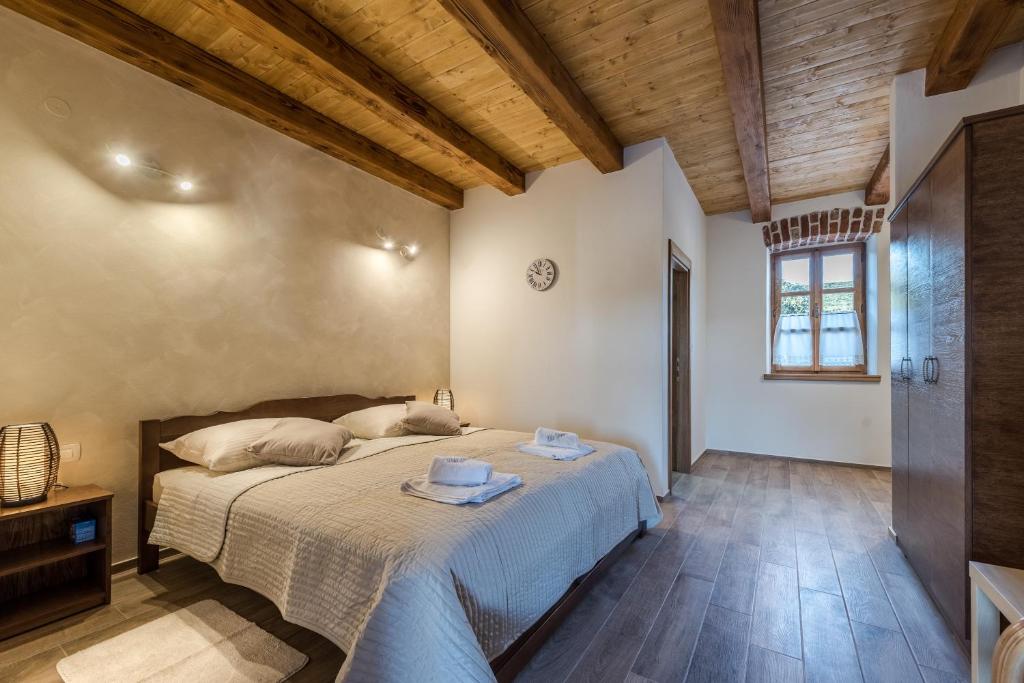 Postel nebo postele na pokoji v ubytování Villa Dumina