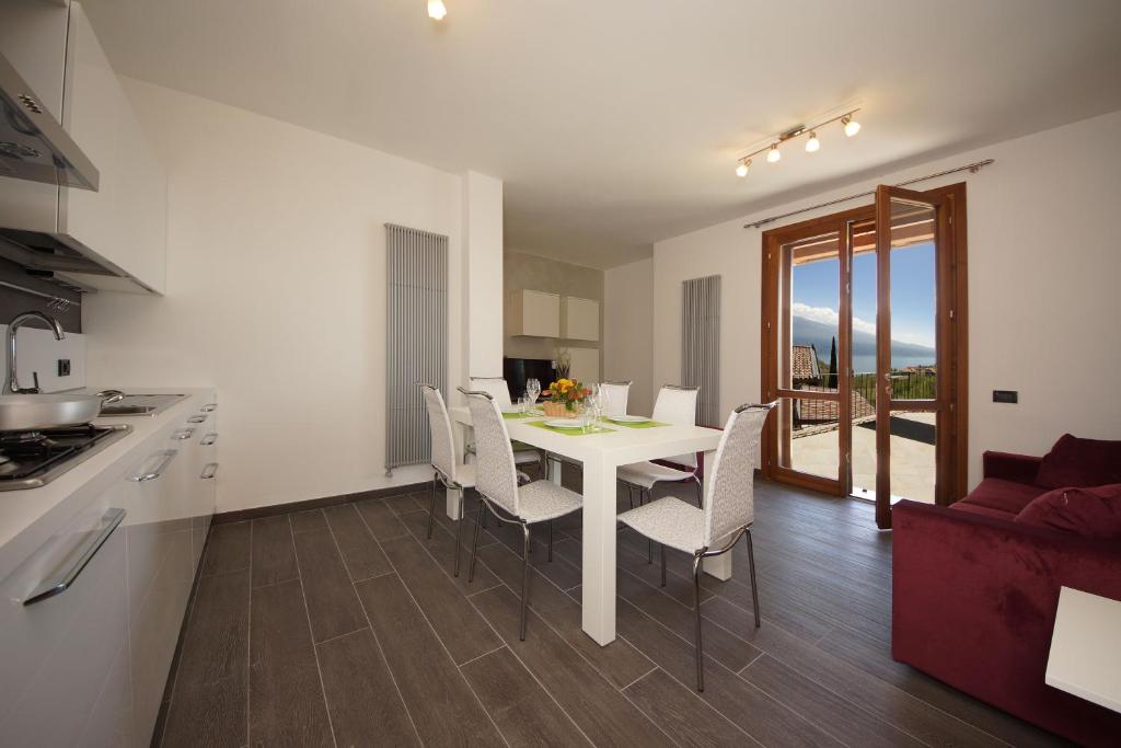 Kuchyň nebo kuchyňský kout v ubytování Les Maisons - Ruculì Hospitality