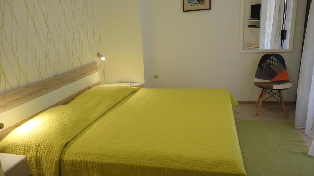 Postel nebo postele na pokoji v ubytování Guesthouse Apartment Božica