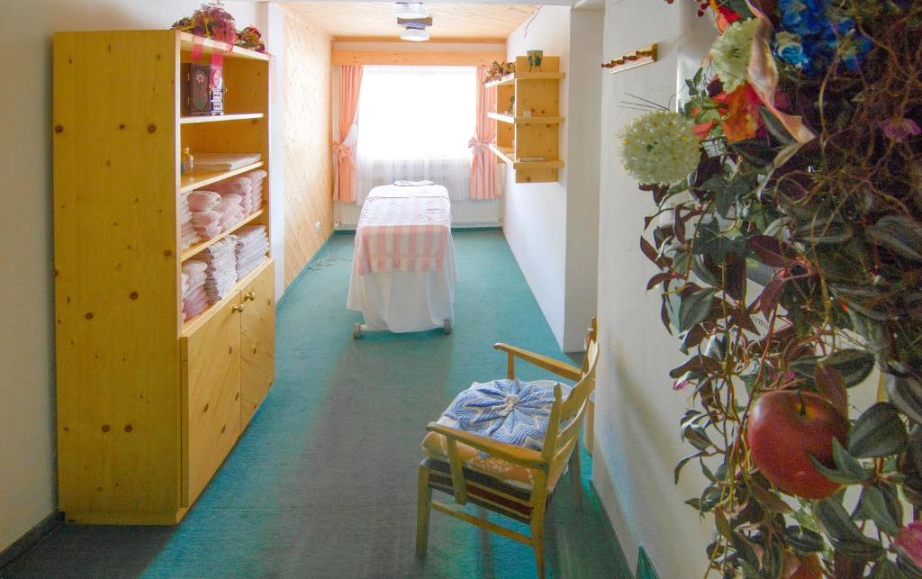 Postel nebo postele na pokoji v ubytování Appartementhotel Hechenberg