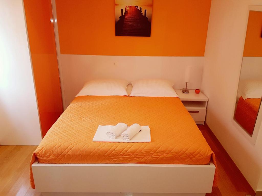 Postel nebo postele na pokoji v ubytování Villa Grgo Apartments