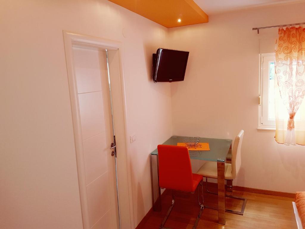 TV a/nebo společenská místnost v ubytování Villa Grgo Apartments