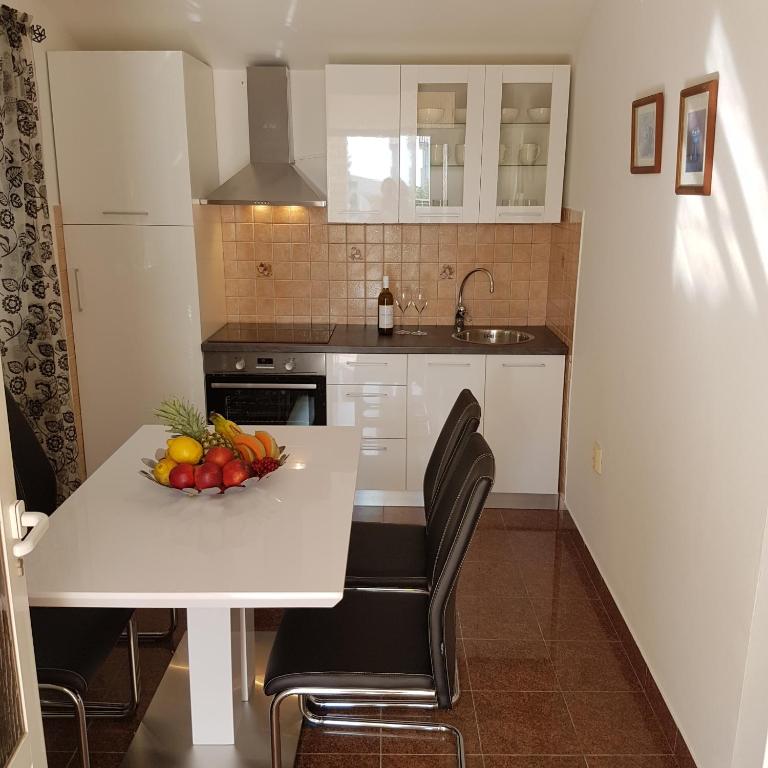 Kuchyň nebo kuchyňský kout v ubytování Apartment Antonio