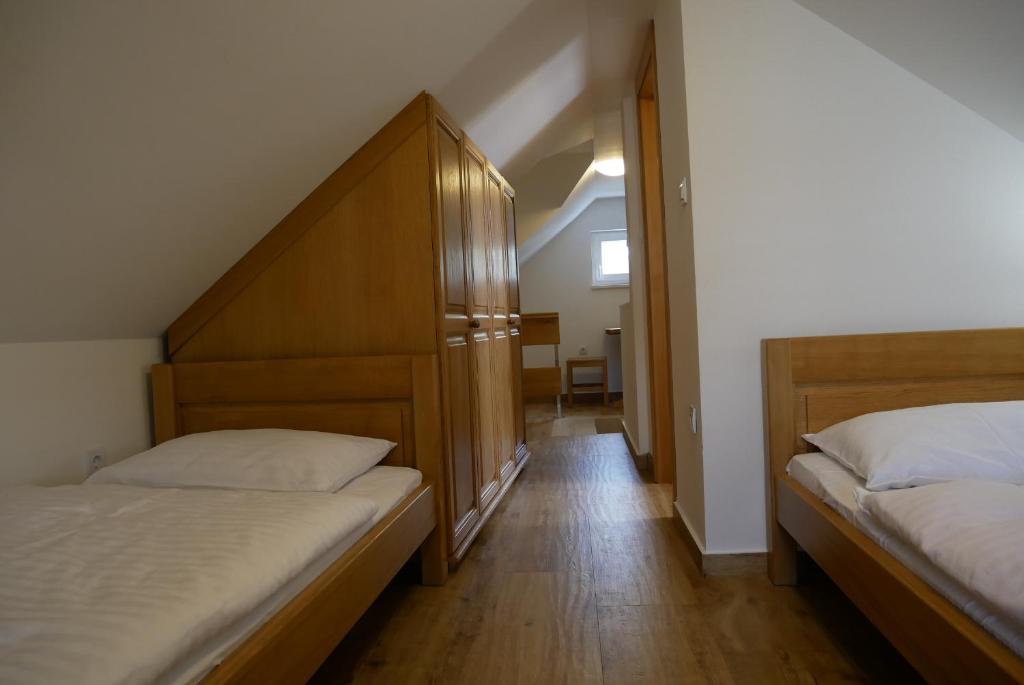 Posteľ alebo postele v izbe v ubytovaní Guest house Jere Old Town