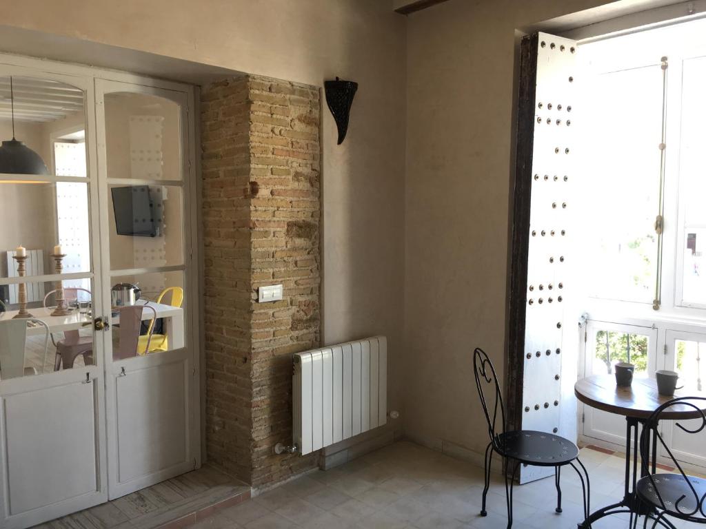 Televízia a/alebo spoločenská miestnosť v ubytovaní Casa Bugambilla Cadiz