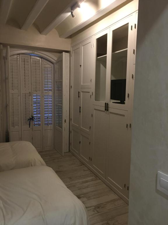 Posteľ alebo postele v izbe v ubytovaní Casa Bugambilla Cadiz