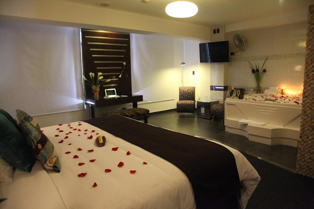 Postel nebo postele na pokoji v ubytování Hotel Rivera Inn