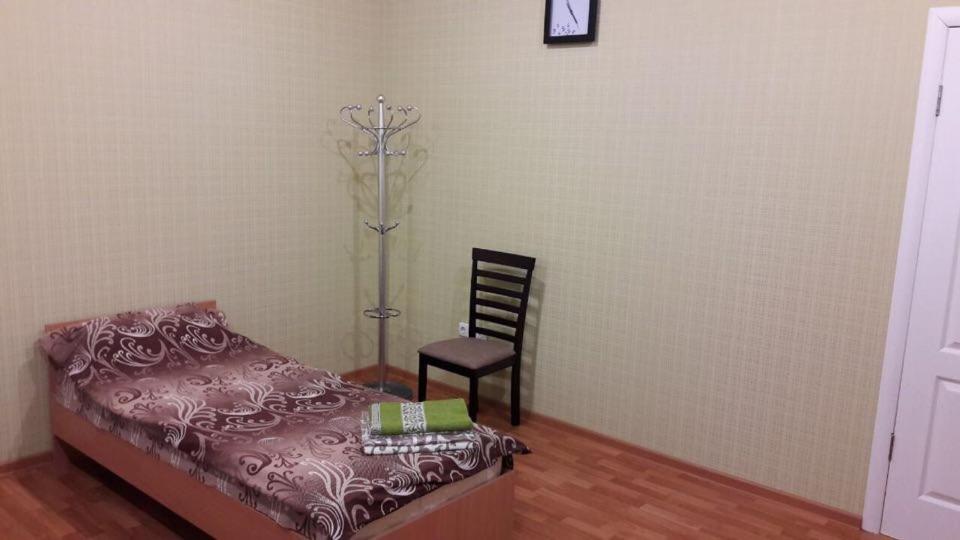 Postel nebo postele na pokoji v ubytování Apartment on Mira avenue