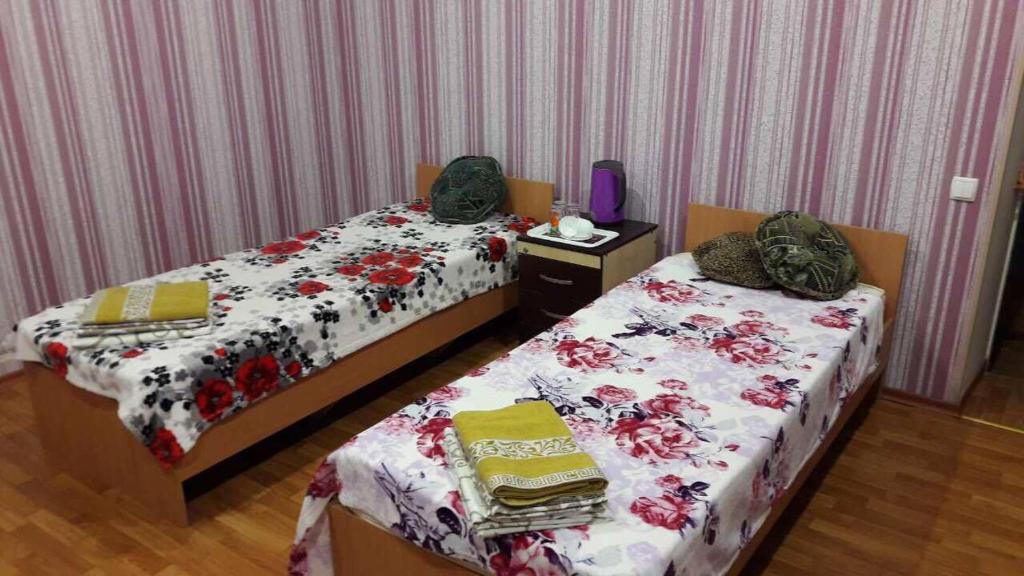 Postel nebo postele na pokoji v ubytování Apartment on Mira avenue