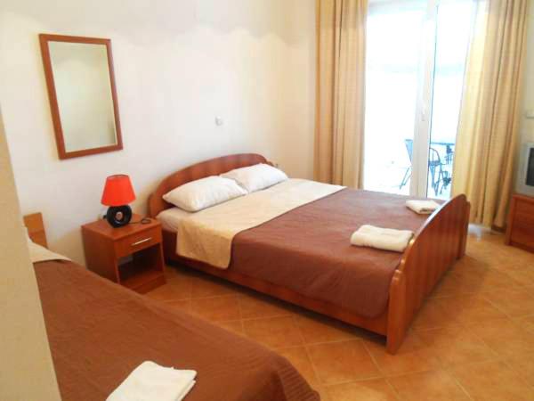 Letto o letti in una camera di Apartments Kepi Gjerana