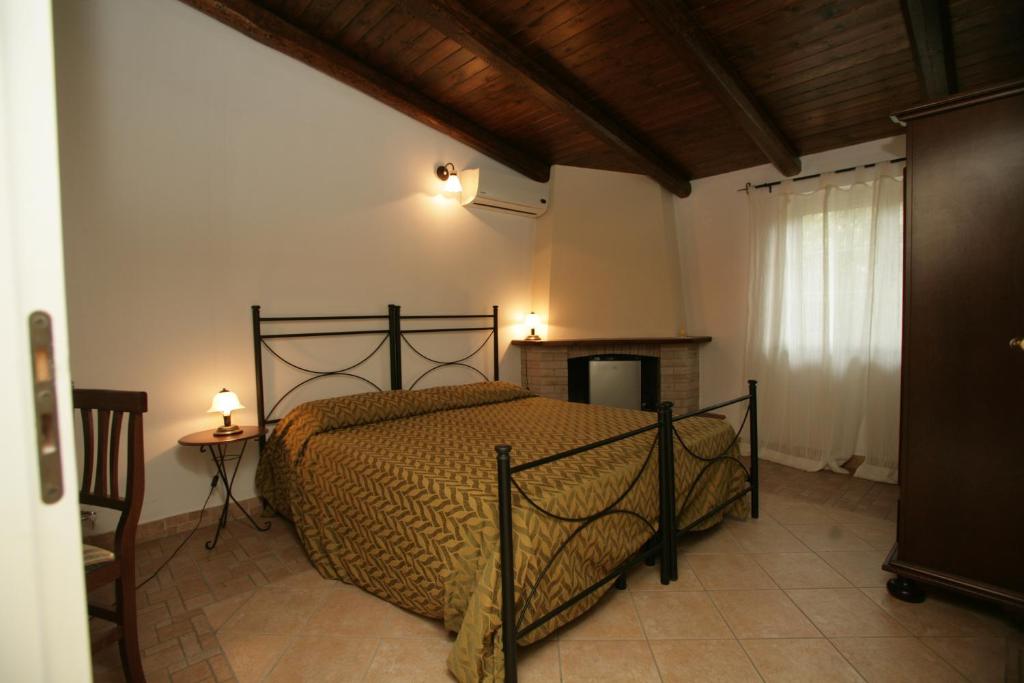 Łóżko lub łóżka w pokoju w obiekcie Bed And Breakfast casagalez
