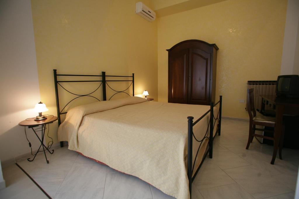 Łóżko lub łóżka w pokoju w obiekcie Bed And Breakfast casagalez