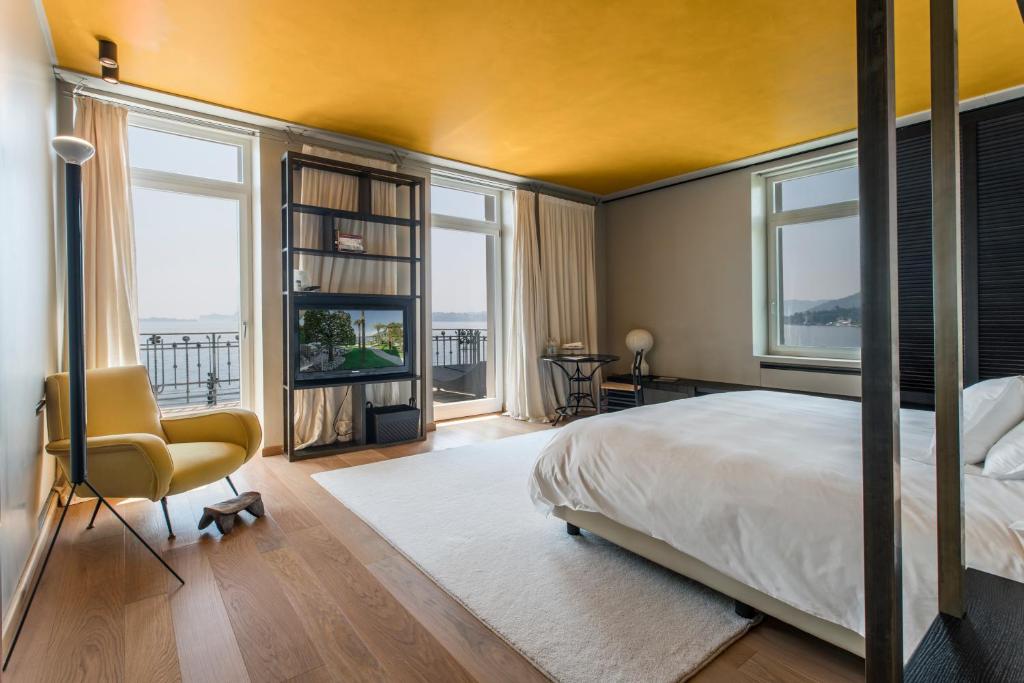 Postel nebo postele na pokoji v ubytování Hotel Bella Riva
