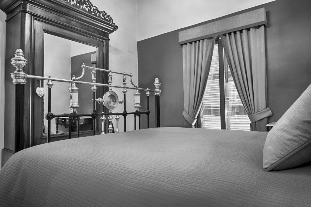 Postel nebo postele na pokoji v ubytování Casa Gemelli Boutique Guesthouse