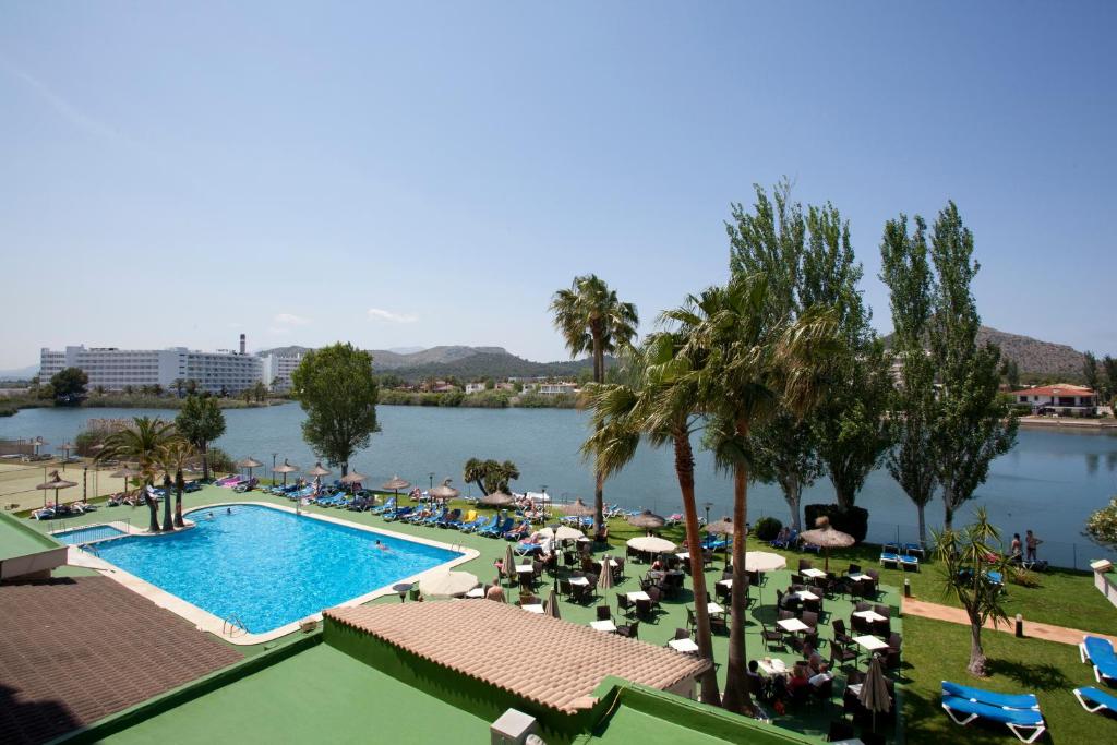 a view of the pool at a resort at Grupotel Amapola in Playa de Muro