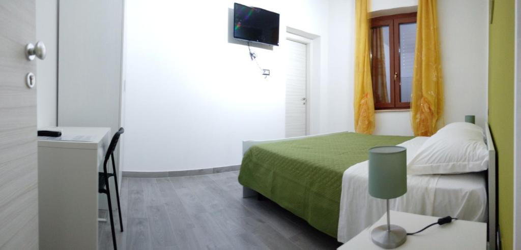 TV a/nebo společenská místnost v ubytování L'angolo di Nina