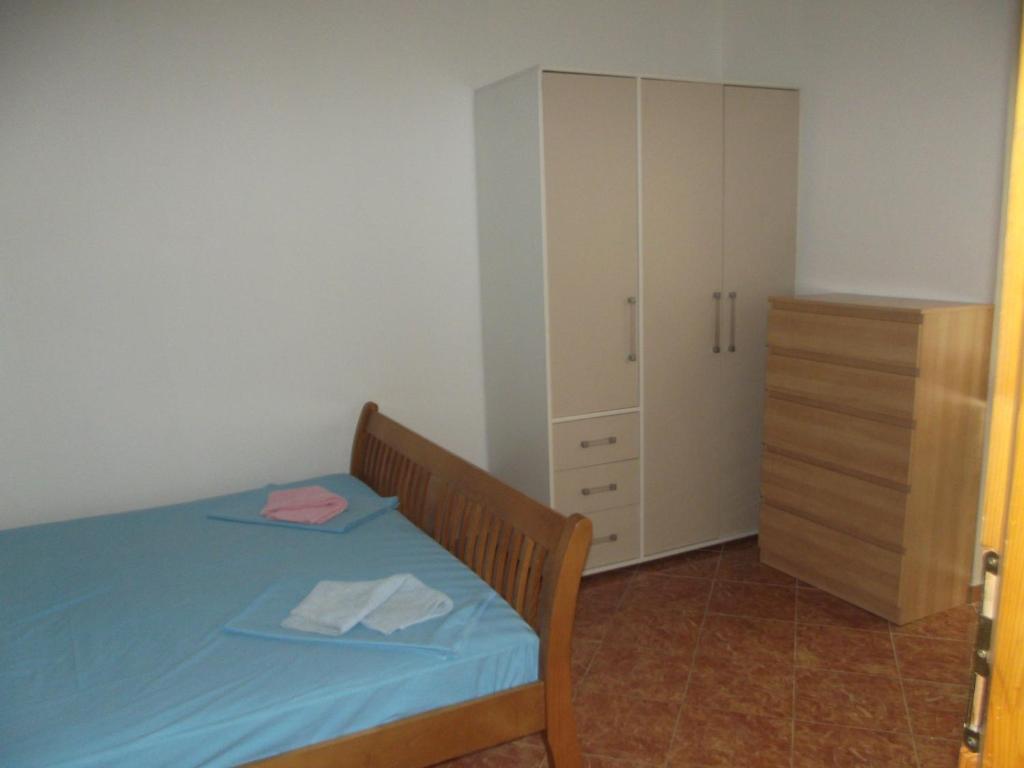 Posteľ alebo postele v izbe v ubytovaní Apartmani Stojanović