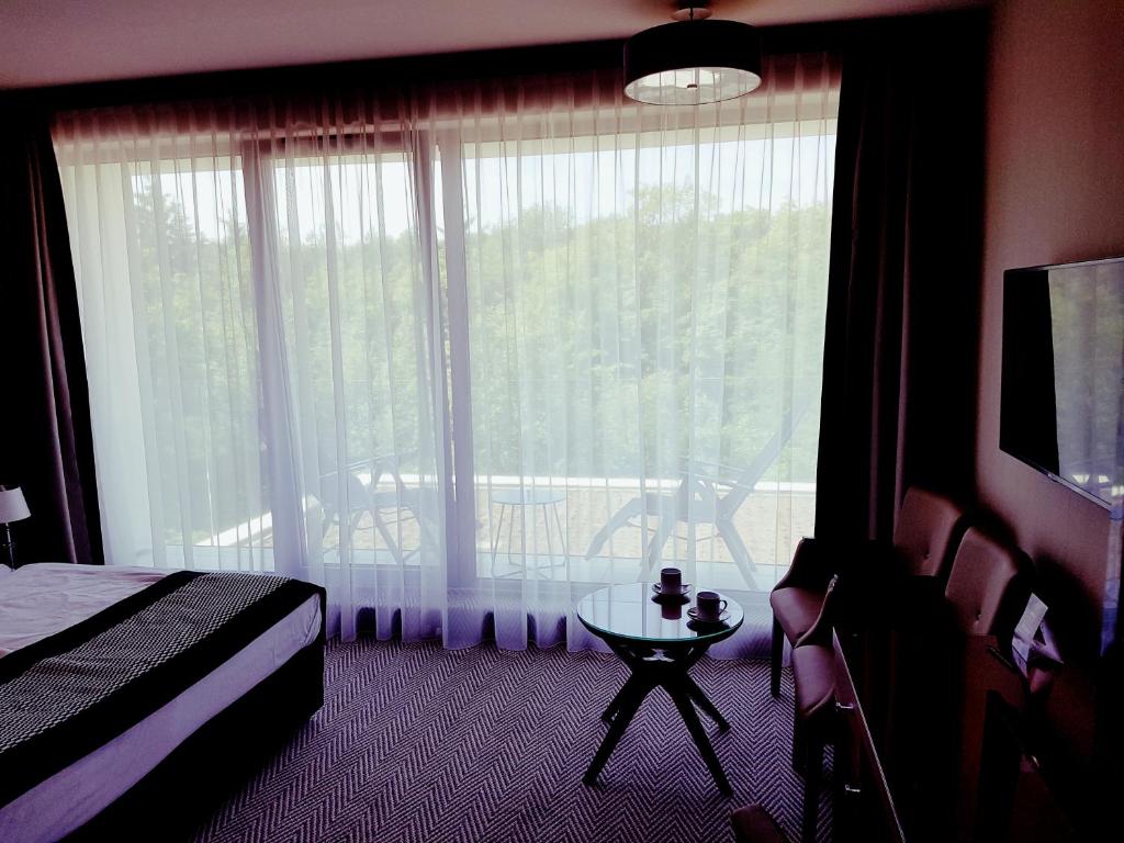 Posteľ alebo postele v izbe v ubytovaní Apartament prywatny 329 w Diune Resort