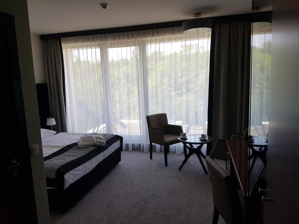 Posteľ alebo postele v izbe v ubytovaní Apartament prywatny 329 w Diune Resort