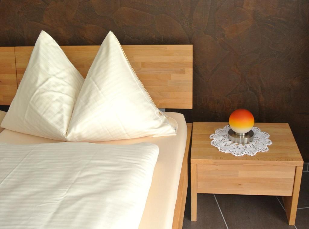 Postel nebo postele na pokoji v ubytování Hotel Restaurant Jura