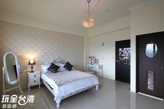 Postel nebo postele na pokoji v ubytování Bai Yun Ge Homestay