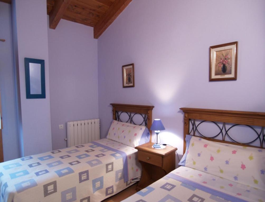Rúm í herbergi á Casa Javier