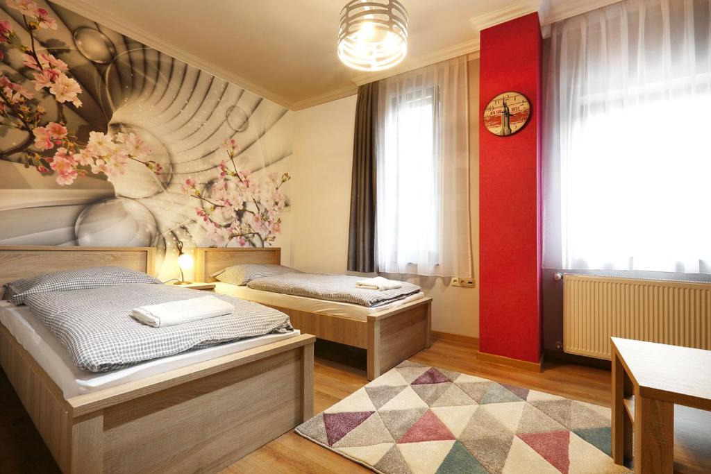 Postel nebo postele na pokoji v ubytování Fehér Hattyú Panzió