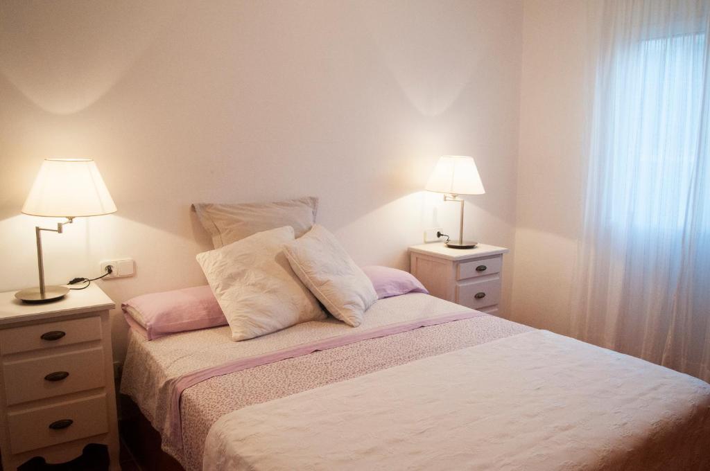 Łóżko lub łóżka w pokoju w obiekcie Villa Ses Vinyes 2