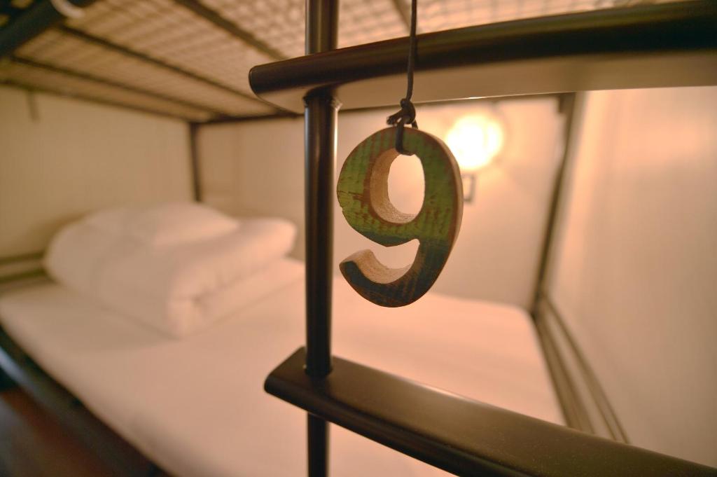 Postel nebo postele na pokoji v ubytování Chillulu Hostel