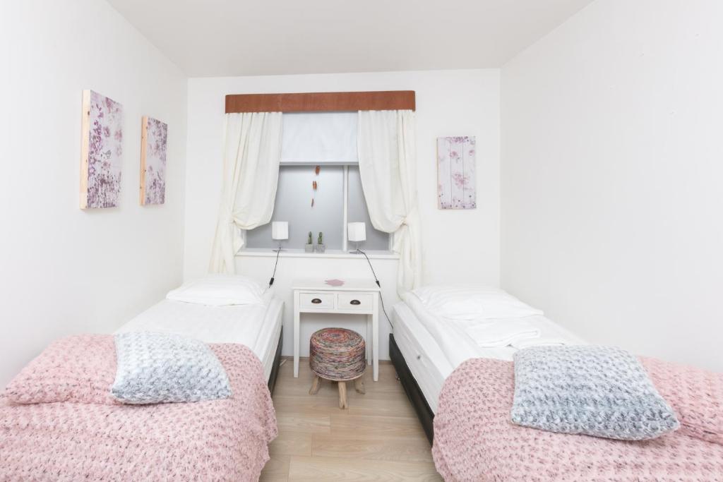 Cama o camas de una habitación en Blómasetrið Homestay