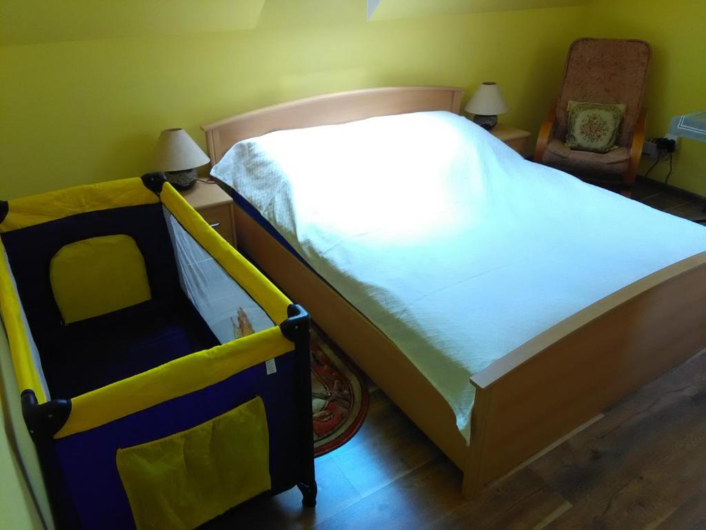 Postel nebo postele na pokoji v ubytování Apartment Helena