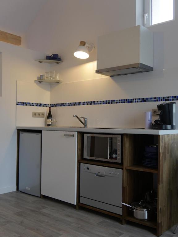 Kuchyň nebo kuchyňský kout v ubytování Aparthouse HAAS41 - Eupen