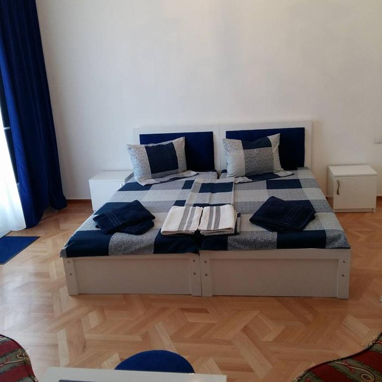 Postel nebo postele na pokoji v ubytování Hotel Renesans