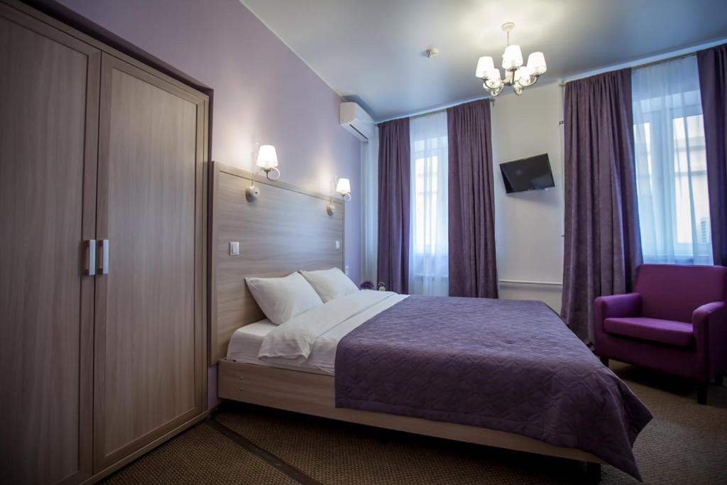 מיטה או מיטות בחדר ב-Arbat Inn
