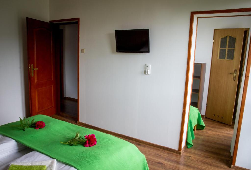 Postel nebo postele na pokoji v ubytování Pokoje U Hanki