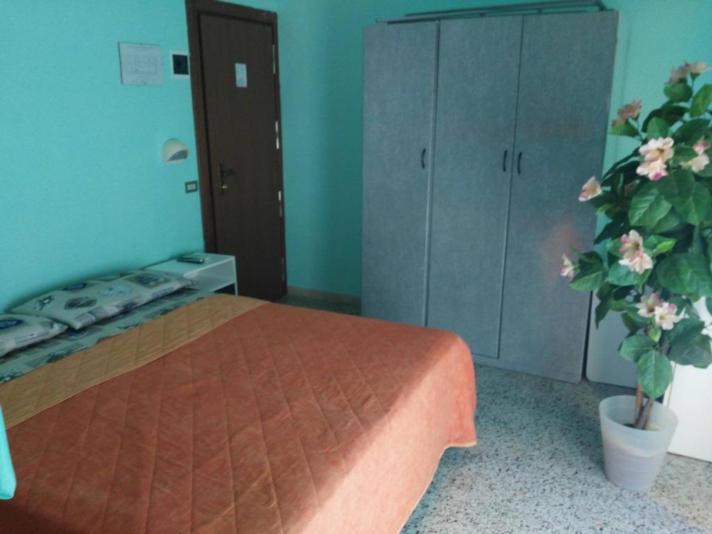 Postel nebo postele na pokoji v ubytování Hotel Acapulco sul mare