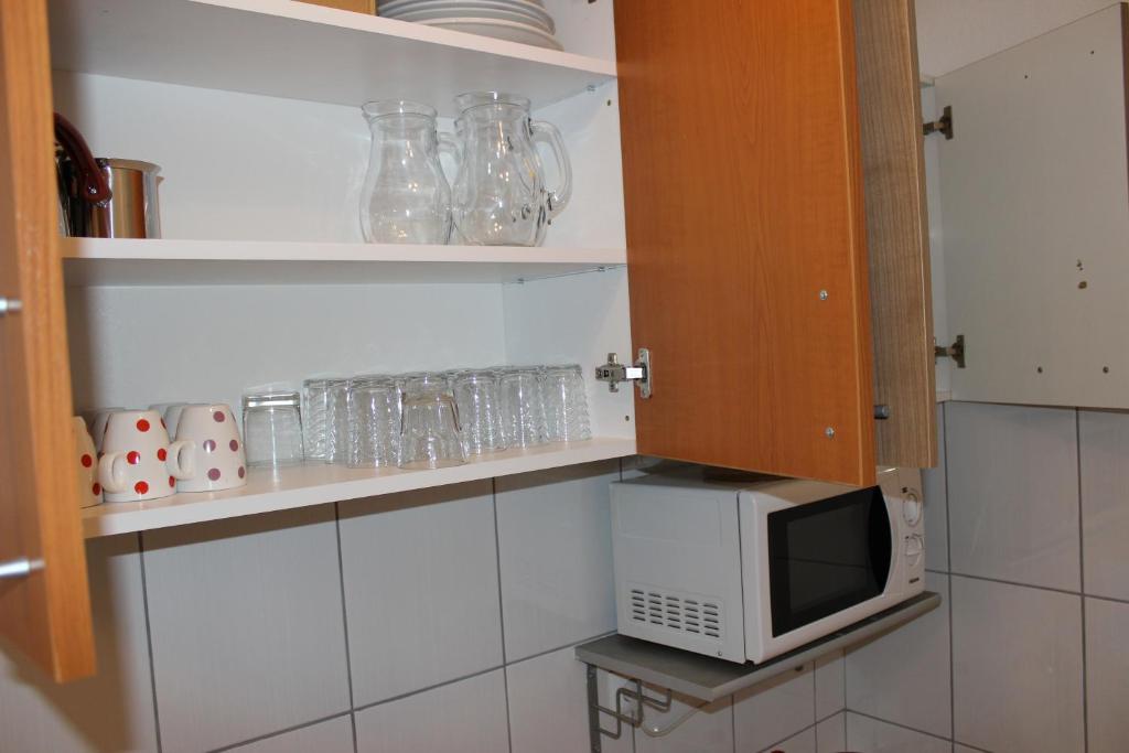 Kuchyň nebo kuchyňský kout v ubytování Guest House Put