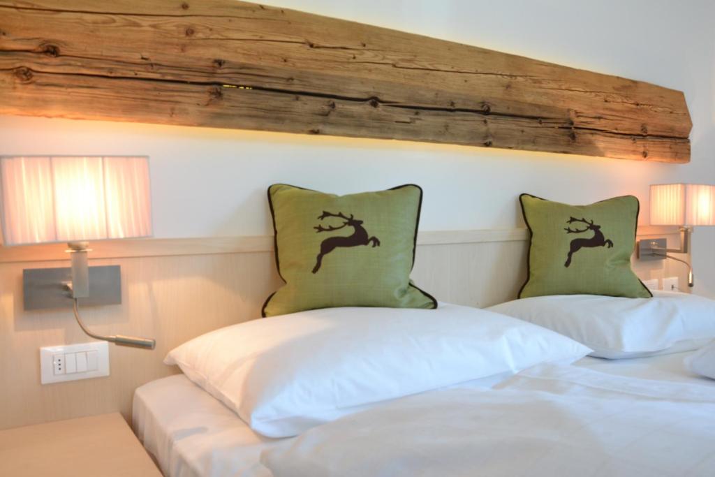 Postel nebo postele na pokoji v ubytování Hotel Regglbergerhof